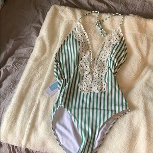 Brand new bathing suit. Adorable. Still has tags.